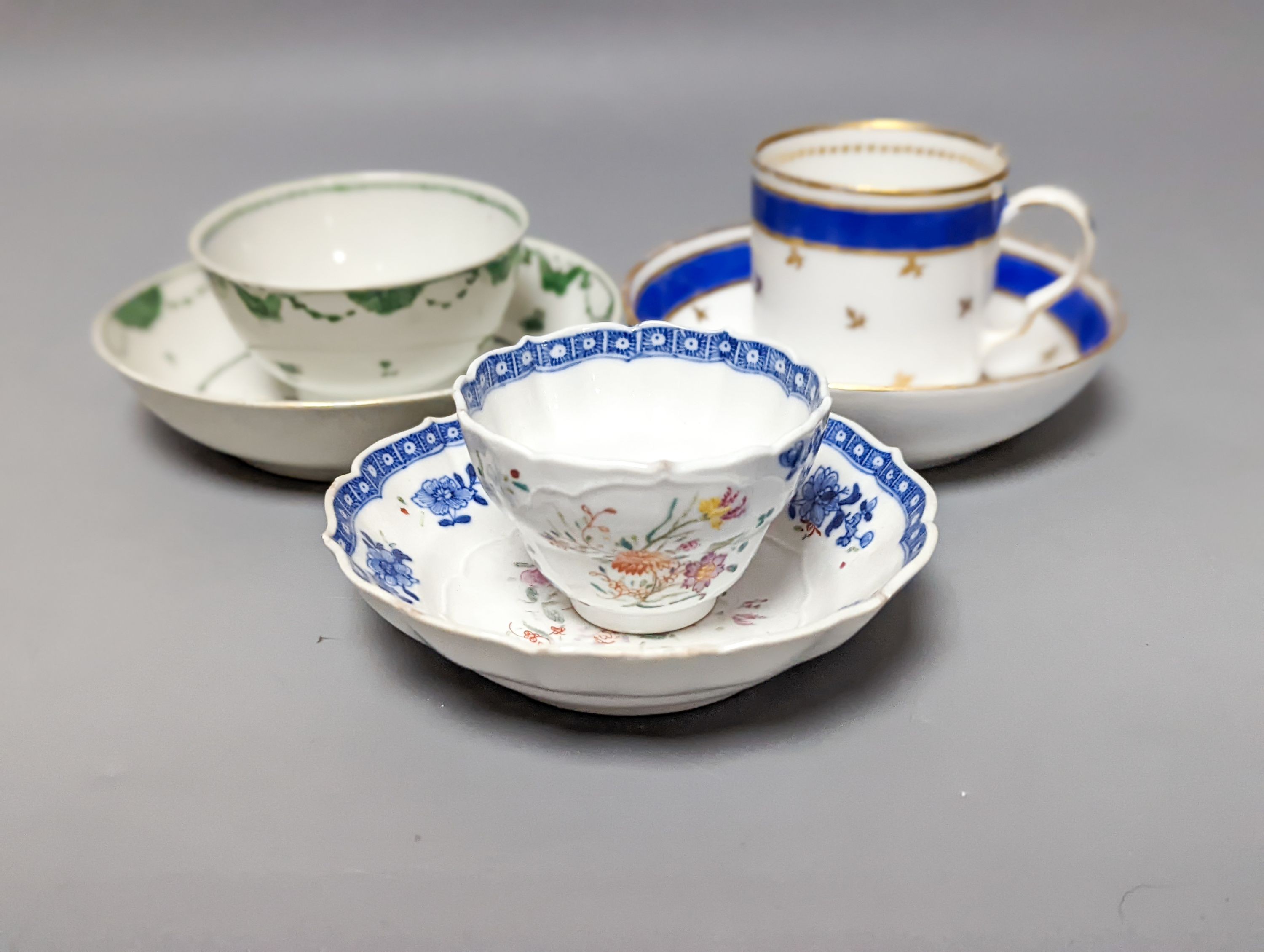 Two 18th century Chinese tea bowls, a 19th century German coffee can and saucer, a Spode coffee can and another